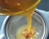 A picture of step 2 of Turmeric Tea with Ginger and Hearbs.