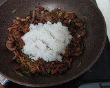 Foto del paso 6 de la receta: Arroz con lomo al wok