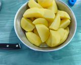 Foto del paso 5 de la receta Muslos de pollo con patatas en el pizzapan