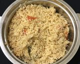 A picture of step 7 of Ghee Coconut Rice.
