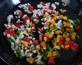 Foto del paso 1 de la receta: Arroz negro con calamar y rape