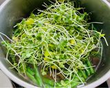 Hình bước làm 3 của món Canh chân giò hầm với cà tím, đậu ve, và rau cải mầm