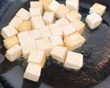 A picture of step 5 of Tofu, Bitter melon, Pork and Egg Stir fry.