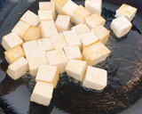A picture of step 5 of Tofu, Bitter melon, Pork and Egg Stir fry.