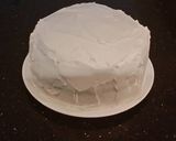 A picture of step 31 of White Layer Cake with a Raspberry Swirl Cheesecake center layer and a Raspberry Cream Frosting.