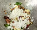 A picture of step 3 of Kerala Fried Coconut Rice.