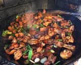 A picture of step 7 of Paella with Vegetables and Meat.