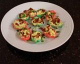 A picture of step 7 of Bacon and Jalapeno Deviled Eggs colored for Christmas.