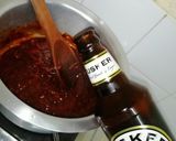 A picture of step 4 of Honey and ketchup glanced chicken drumsticks.