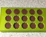 A picture of step 3 of Gur dhana chocolate bitesWhen its engagement or wedding jaggery and coriander seeds are offered.