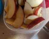 A picture of step 2 of Chicken breast on a bed of sauted apples and onions.