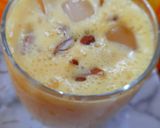 A picture of step 3 of Orange Lassi.