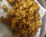 A picture of step 3 of Crispy masala peanuts.