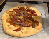 A picture of step 3 of Coca de Escalivada with Anchovies.