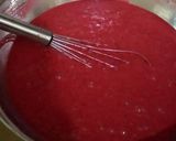 A picture of step 3 of Red velvet cake with white chocolate cream cheese frosting.