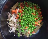 A picture of step 2 of # mixed vegetables pulao in my style.