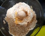 A picture of step 5 of Crispy Baked Onion Rings.