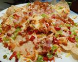 A picture of step 4 of Mexican Nachos with Peppers, Onion, and Bacon.