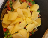 Foto del paso 3 de la receta: Pulpo guisado con patatas y calabaza