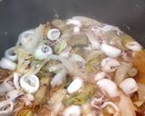Foto del paso 3 de la receta: Arroz con calamares y alcachofas