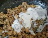 A picture of step 8 of Nutty lemony cabbage roll in green sauce.