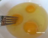 A picture of step 4 of Spinach and Enoki Mushrooms with Eggs.