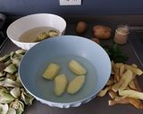 Foto del passaggio 1 della ricetta Patate riso e carciofi al forno