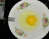 A picture of step 1 of Omelet Sandwich.