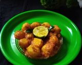 A picture of step 3 of Baby potatoes dom with maize flour.