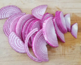 A picture of step 1 of Super Easy Pickled Red Onions.