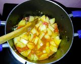 A picture of step 4 of Boiled rice served with minji stew and potatoes.