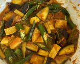 A picture of step 3 of Okra masala with aubergine & sweet potato.