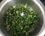 A picture of step 1 of Onion leaves pokora.