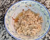 Foto del paso 8 de la receta: Alubias con almejas y alcachofas