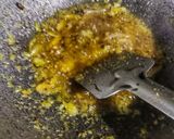 A picture of step 2 of Koi komola, climbing fish curry with orange juice.