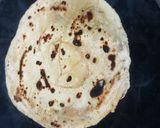 A picture of step 8 of Shahi paneer with lacha paratha.