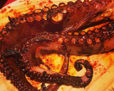 Foto del paso 4 de la receta: Pulpo a la brasa con papas con mojo verde