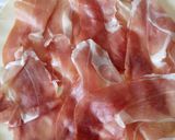 A picture of step 1 of Parma ham and smoked cheese roll up pie.
