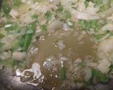 Foto del paso 7 de la receta Alubias blancas con tomate, ajo y perejil