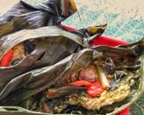 A picture of step 5 of Pepes Ayam / Indonesian Steamed Chicken in Banana Leaf.
