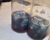 A picture of step 2 of Blue pea magic layered mocktail.