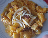 Foto del paso 3 de la receta: Picadillo de naranja con anchoas y huevos fritos