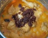 A picture of step 14 of Chicken Korma.