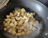 A picture of step 4 of Onam Sadhya Kootu Curry With Kerala Matta Red Rice.