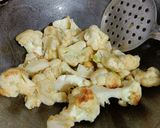 A picture of step 1 of Dahi masala gobhi.