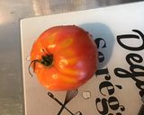 Une image de l'étape 4 de Salade du jardin,tomate cœur de bœuf,fromage frais mariné et ciboulette.