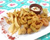 Foto del paso 7 de la receta: Frutos de mar: Rabas, langostinos y camarones fritos