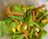 A picture of step 1 of Green chilli garlic carrot achar.