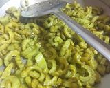 A picture of step 3 of Karela Pyaz.