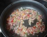 Foto del paso 3 de la receta: Rehogado de arvejas con salchichas frescas y arroz blanco